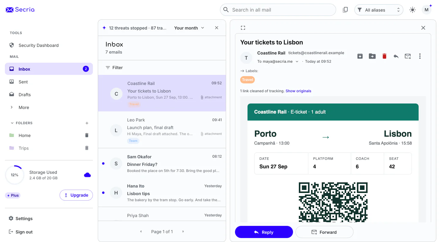 Secria Mail open on an inbox, with labels such as Travel and Team, and a train ticket open beside the list.